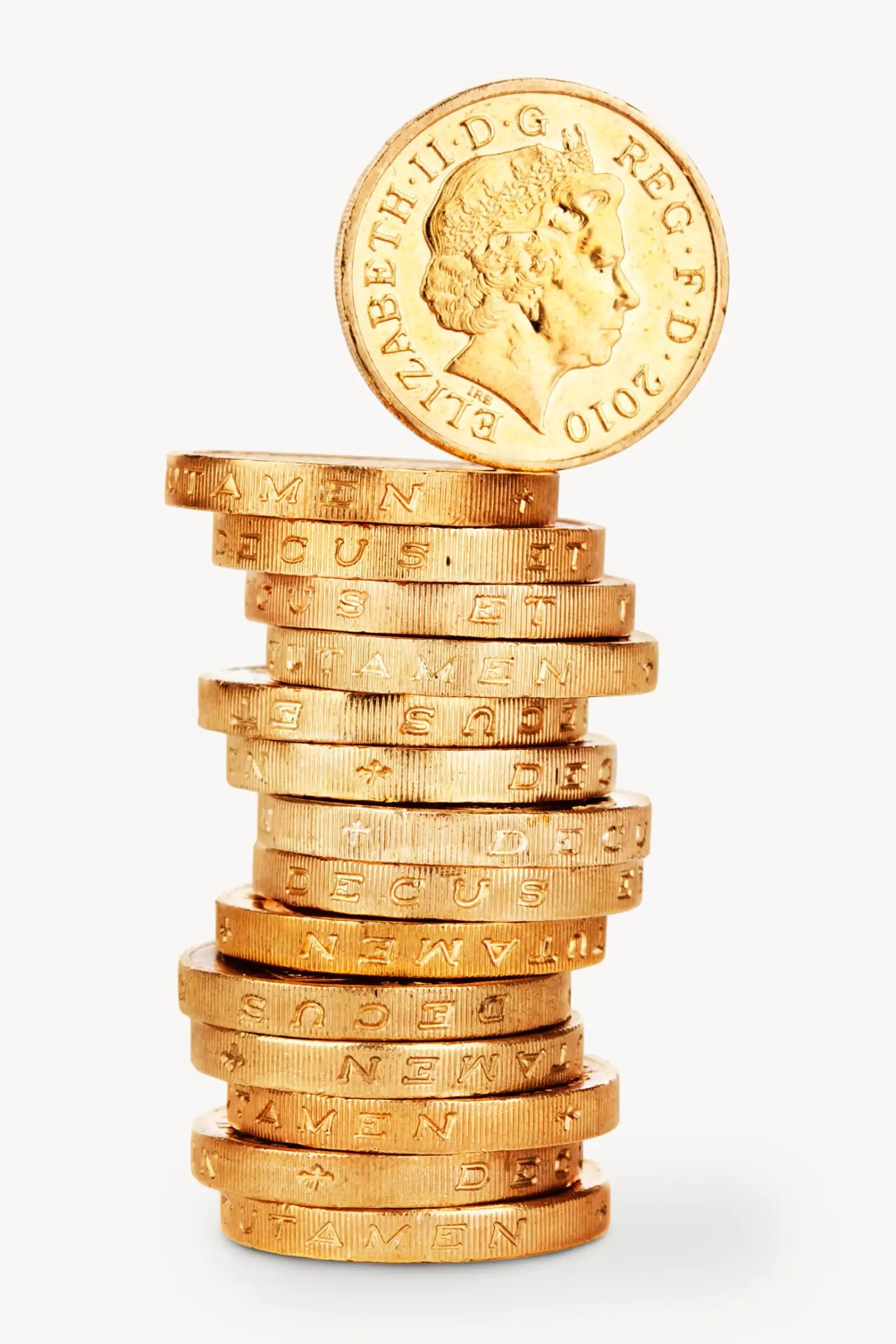 A stack of pound coins with one coin balanced upright on top
